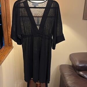 Never wore. Just in closet taking up space. Swim cover up.